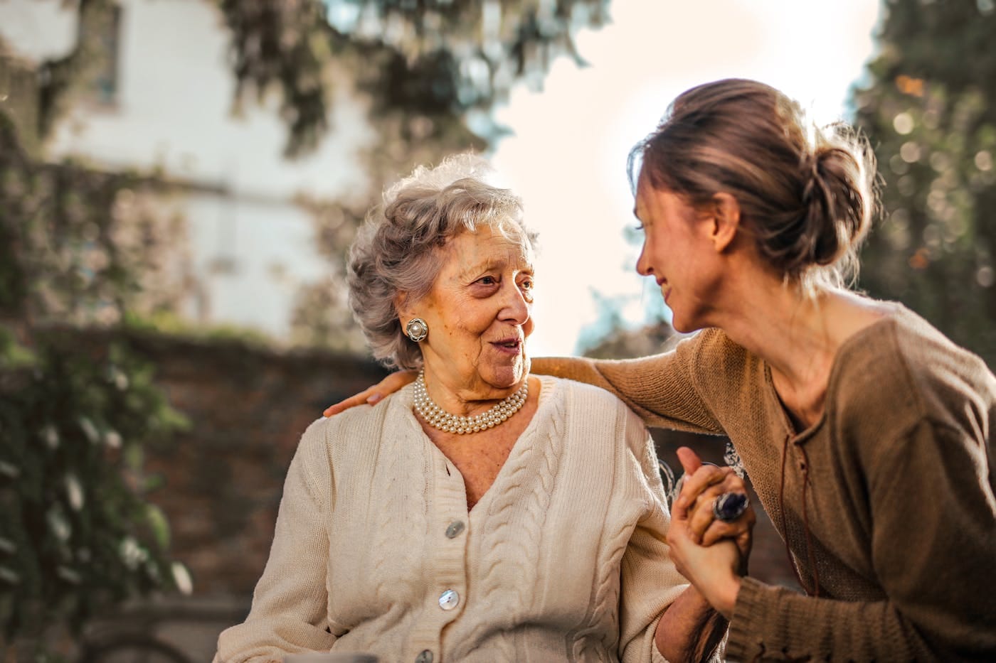 Amigo support worker sharing a warm moment with an elderly participant in Sydney